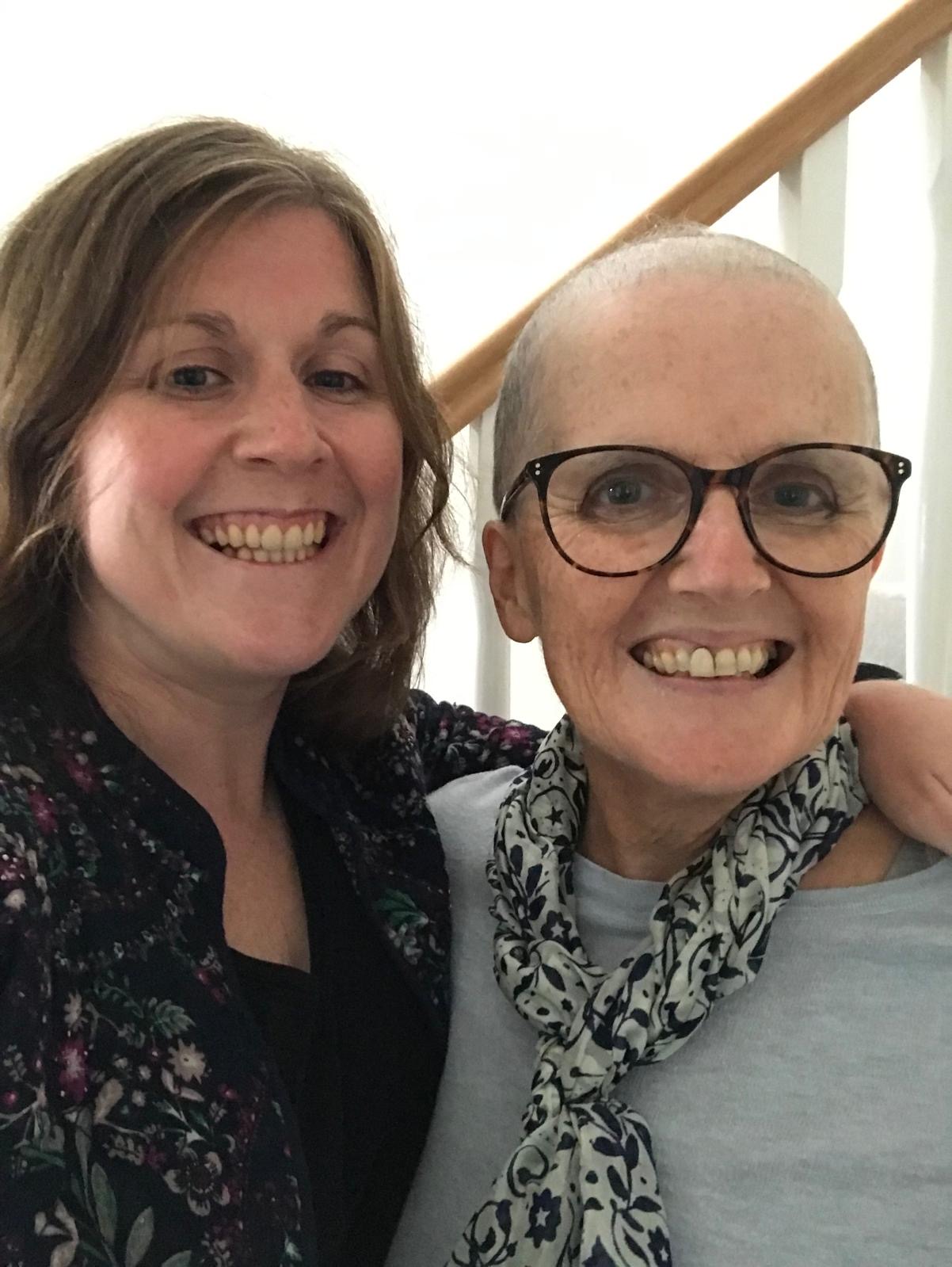 Our Head of Fundraising and Philanthropy, Sian, with her lovely mum. Both are smiling at the camera with their arms around each other.